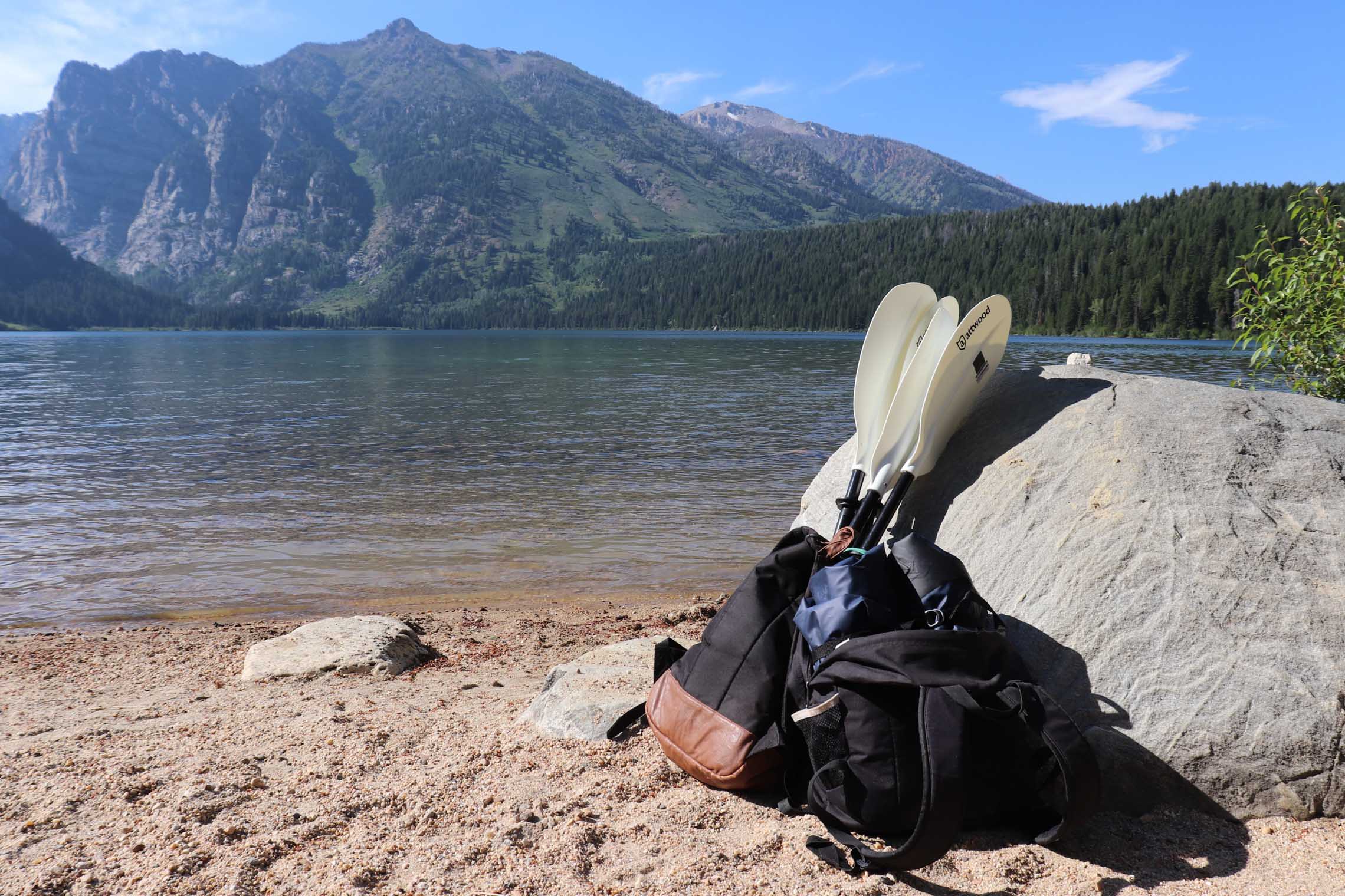 Packed up packraft next to a lake. Why the Hornet Life Kokopelli Packraft is for you