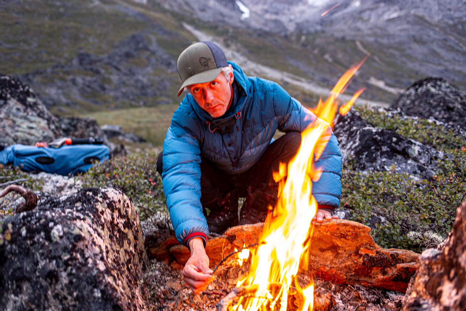 Keeping warm in the Tasermiut Fjord - South Greenland with a roaring campfire