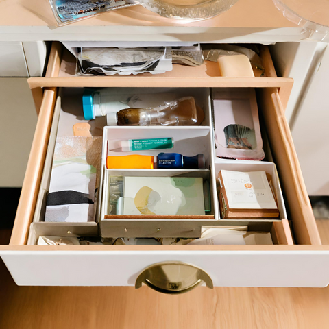 a drawer that has a bunch of small things in them