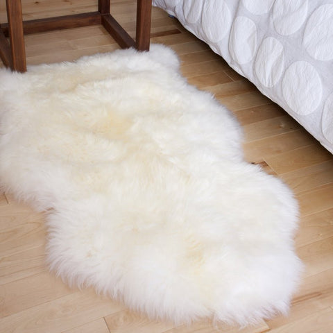 Genuine Sheepskin Rug Beside Bed