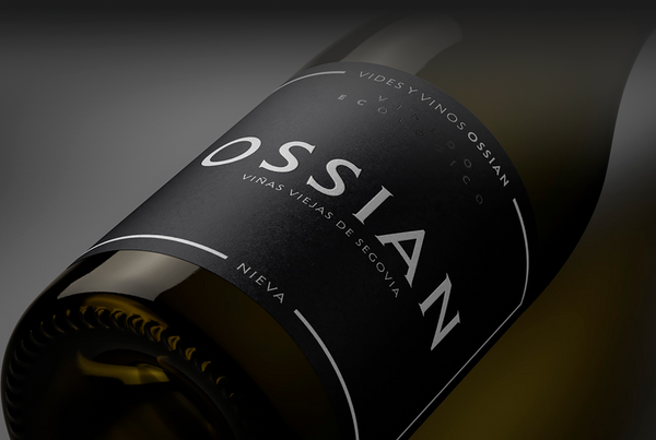 Bottle of wine lying down, showing Ossian in white on the black label