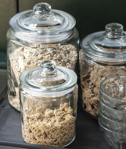 Alt="Danish glass storage jars filled with cereals"