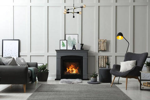 alt="Nordic styled living room with open fire"