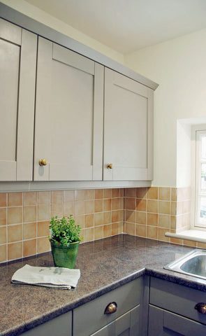 ALT="Repainted grey kitchen cupboard"