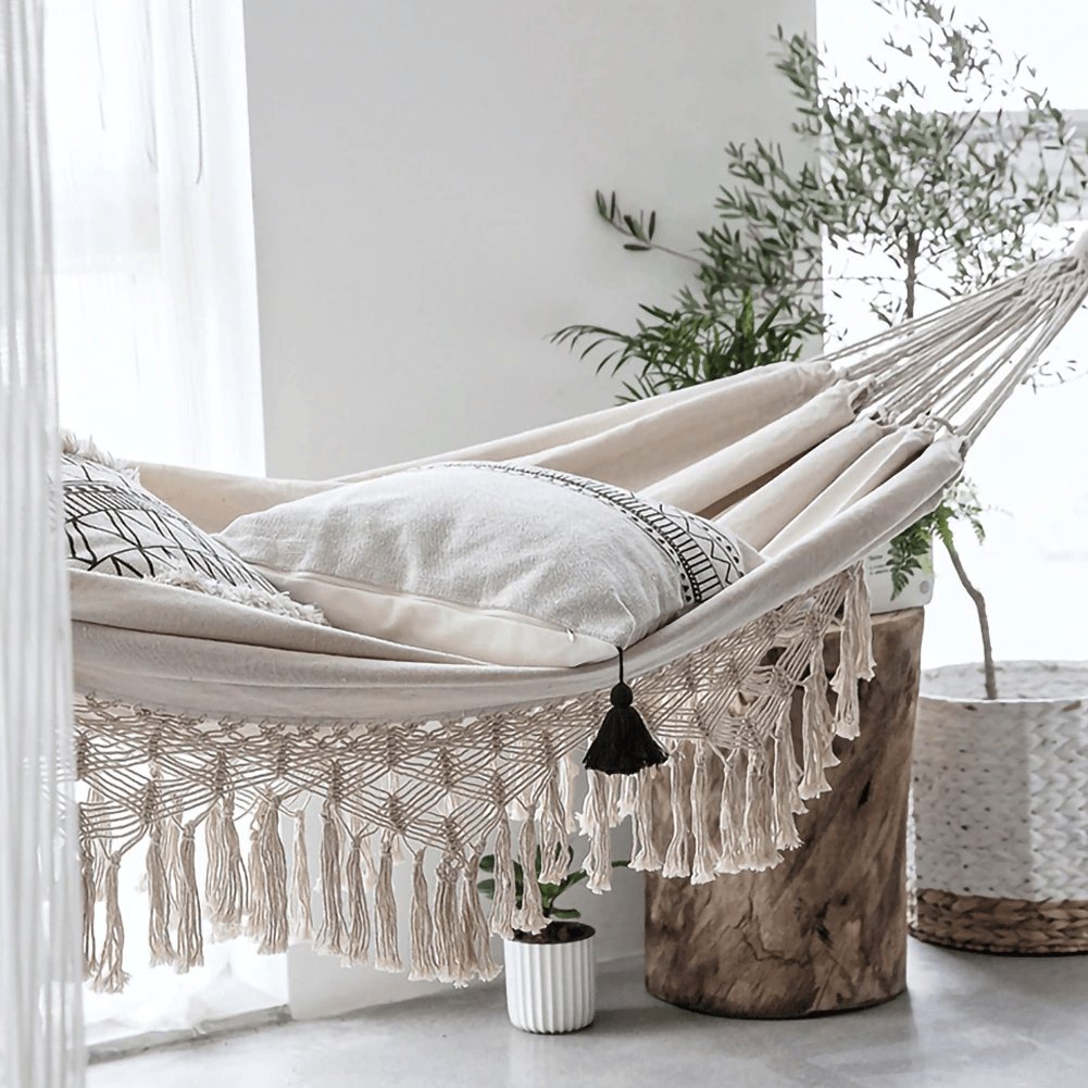 https://cdn.shopify.com/s/files/1/0463/4001/4229/products/macrame-hammock-520442_2048x2048.jpg?v=1675559519