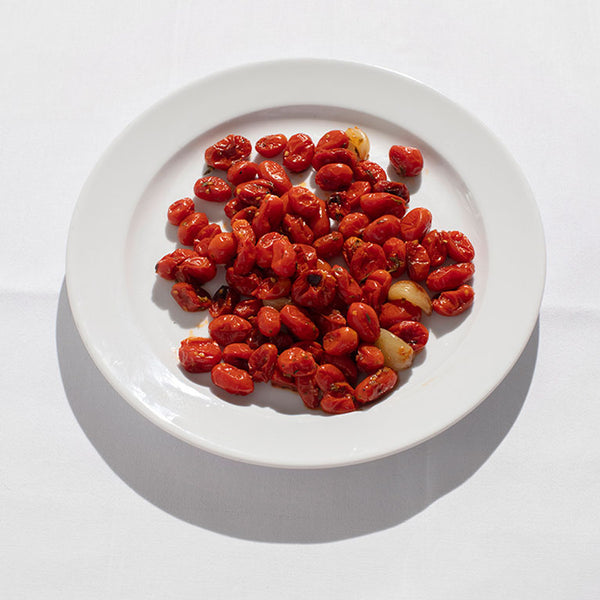 Small datterini tomatoes roasted with garlic.