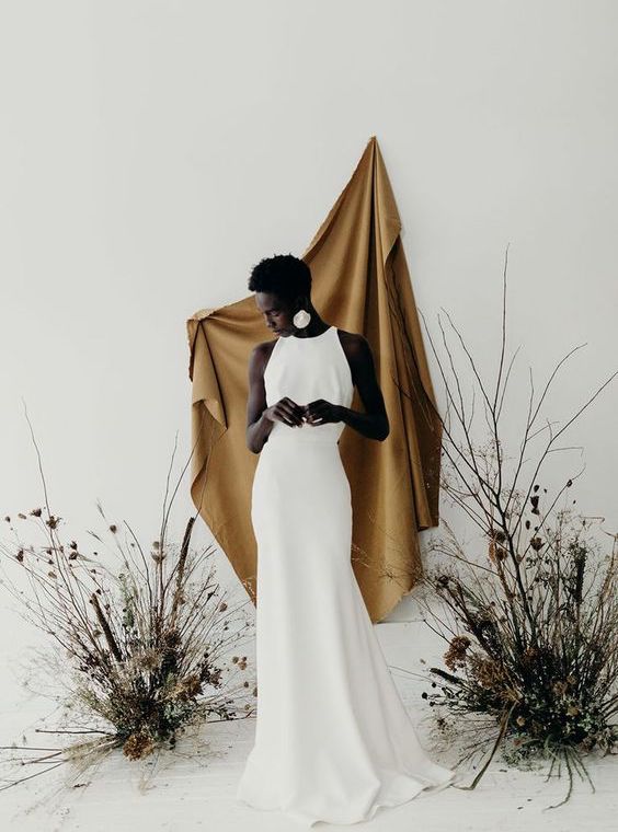 dark-skinned bride in a white dress