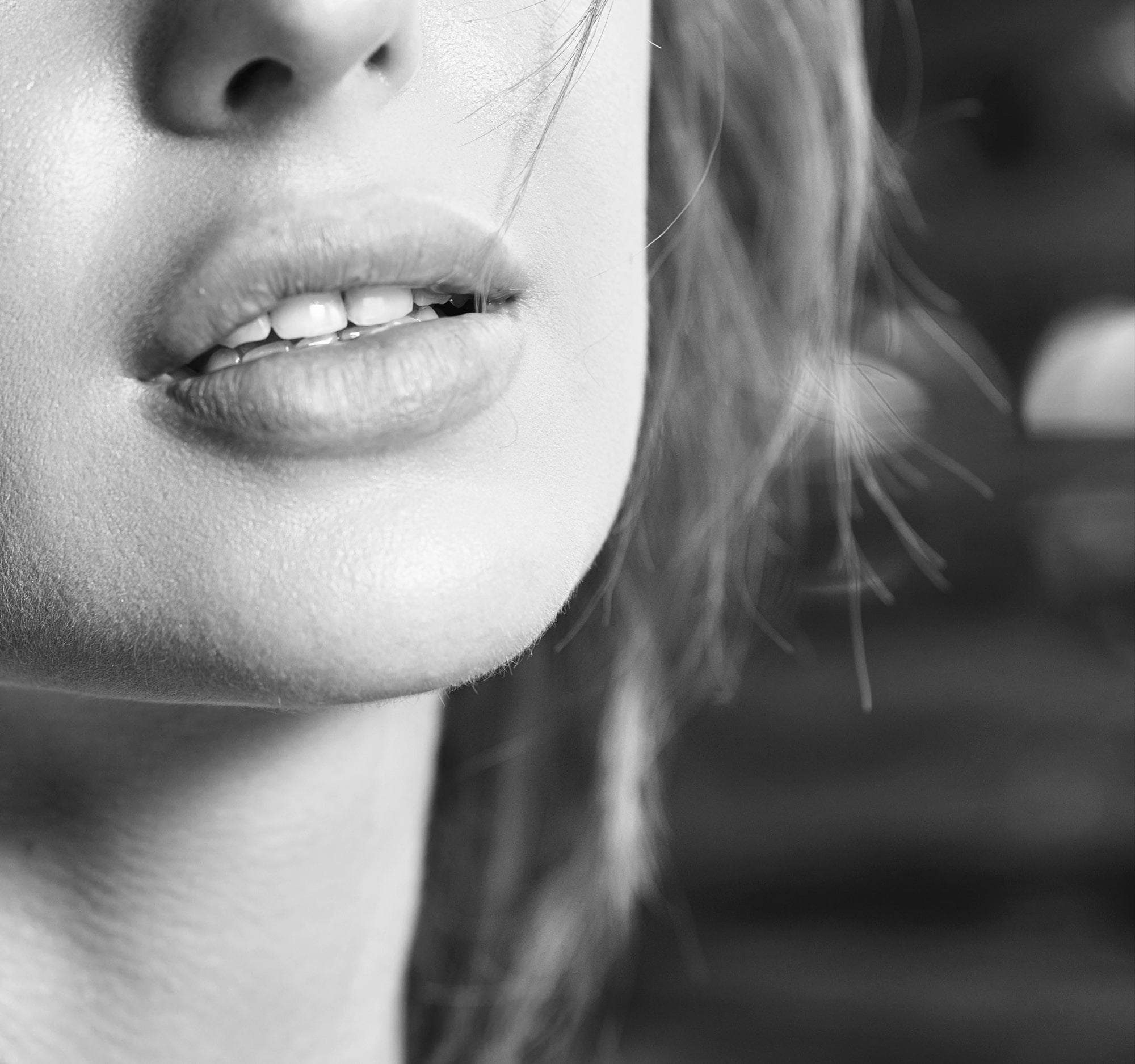 woman with big lips black and white photo