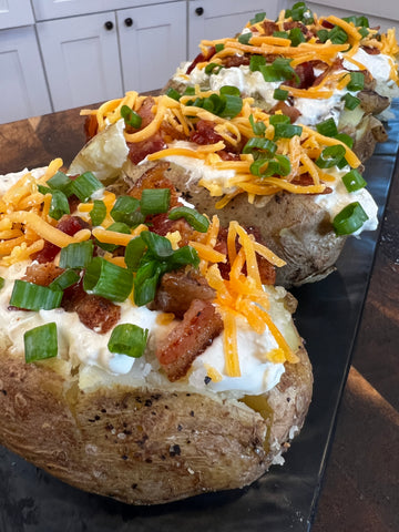 image of baked potatoes on a tray