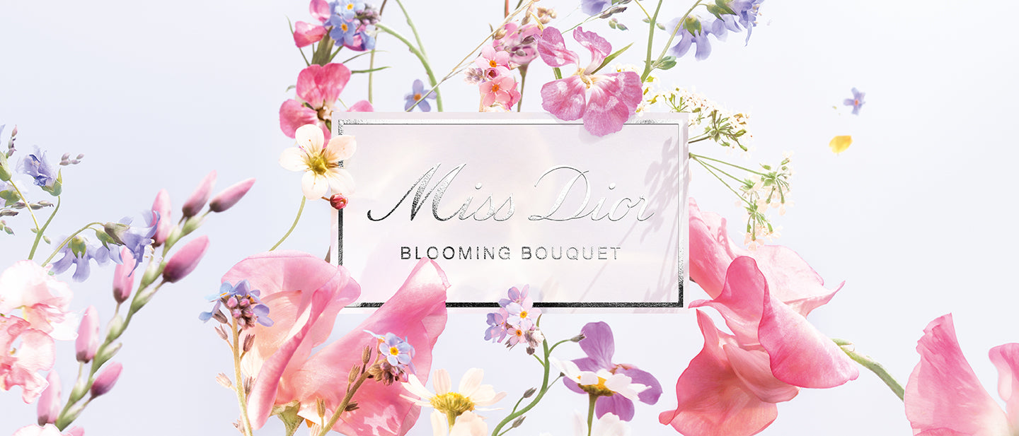 โลโก้ Miss Dior Blooming Bouquet ถูกห้อมล้อมไปด้วยดอกไม้