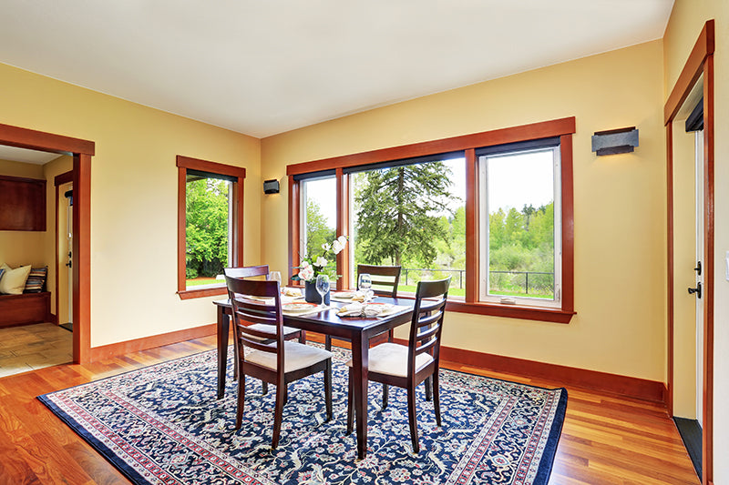 Wide-Sighted Dining Room With Dining Table Set of 4 Seaters，4Pieces of Wooden Stool with Backrest,White Cushions,One Wooden Table,Wine Cups,Delicious Food Ready for the Guest