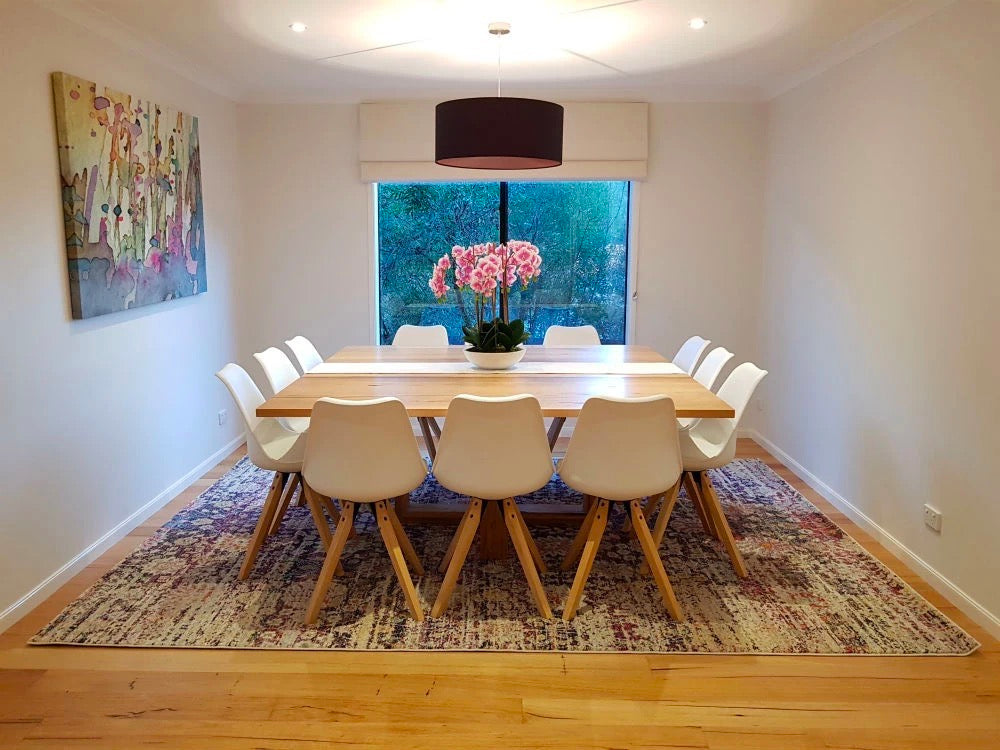 Mixed Color Rugs With the Right Size for The dining room filled by Dining Table Sets:12Pieces White Bar Stools with Backrest，One Big Wooden Table,Living Pink Flowers and Wall Arts Painting