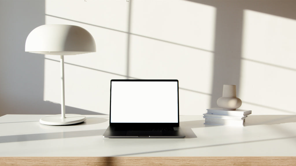 White Wooden Office Working Desk，One White Lamp With Metal Base, One Laptop 