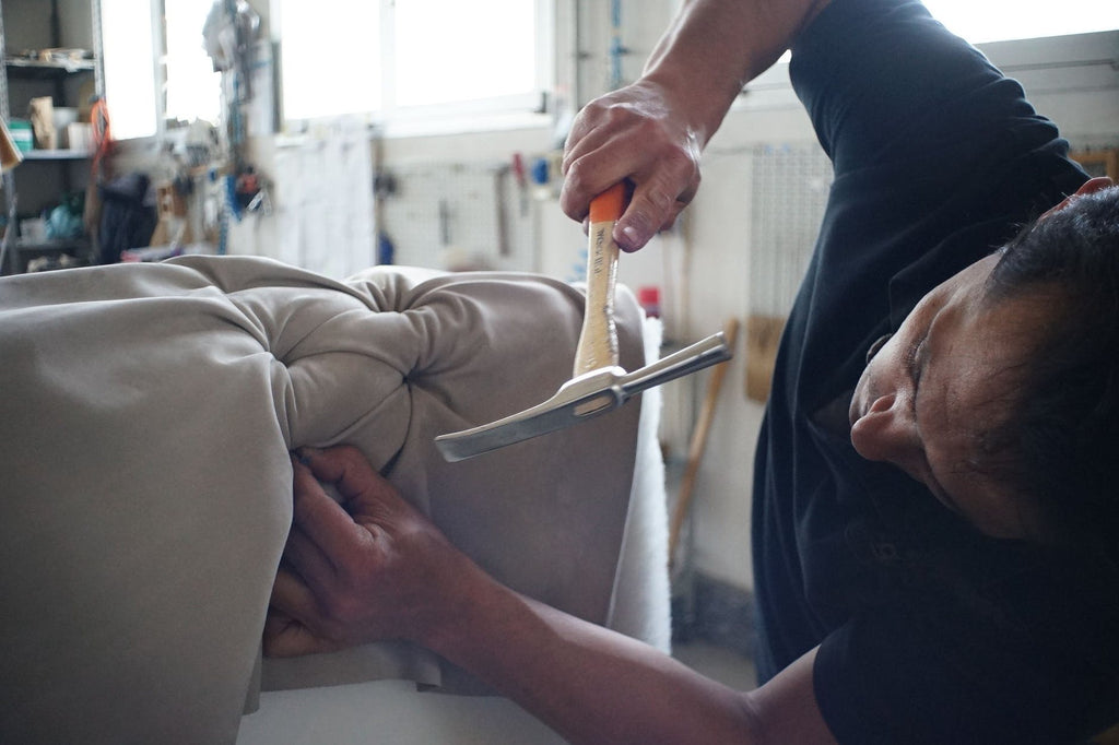 The Velvet Sofa with The cushions Fixed by one man Using the household Tools:Hammer