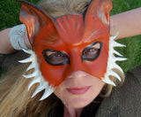 Caroline Guyer or Teonova and Maskelle Masks wearing Teonova Leather Fox Mask