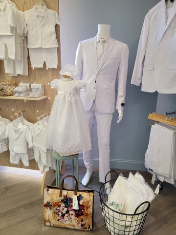 Dressed in White new location in Provo Utah. Men's white temple suits