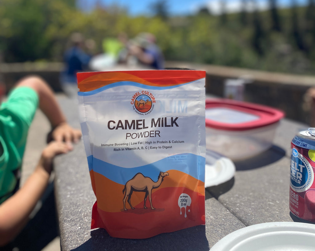 A bag of tasty camel milk powder outdoors at a picnic on a sunny afternoon.