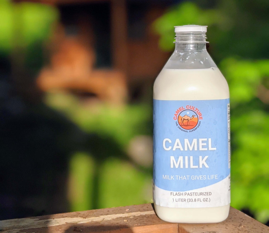 bottle of camel milk in a green forest