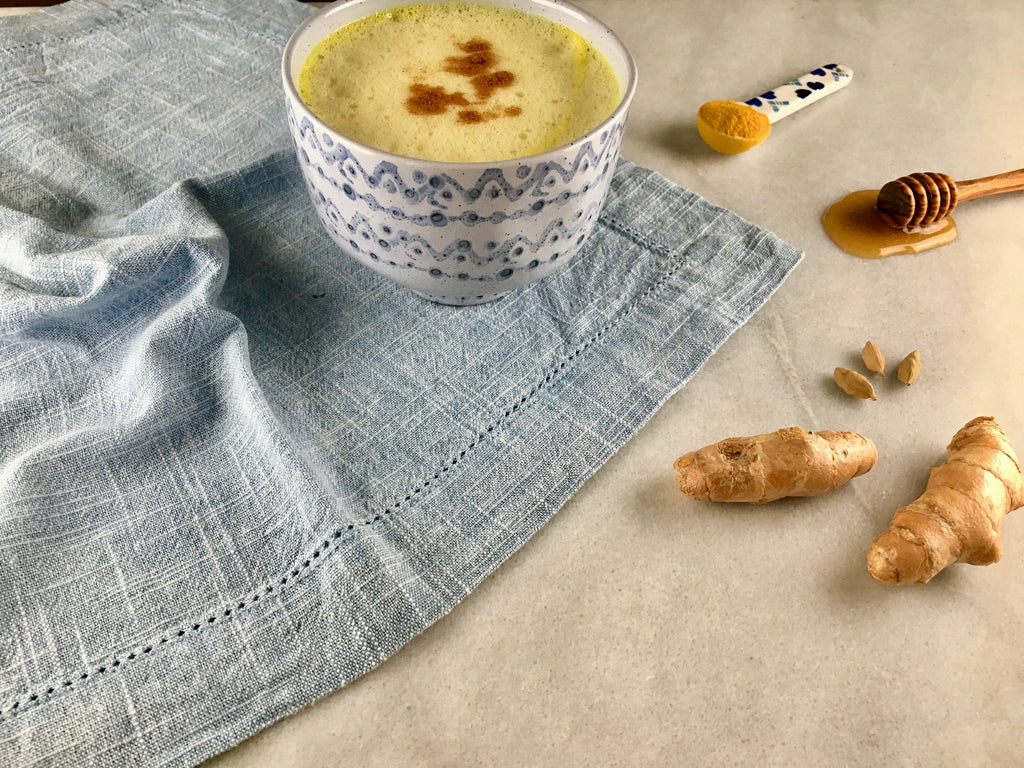 Camel milk being offered as a gift to welcome guests. Images show a coffee mixed with camel milk, ginger, and tumeric spices. 