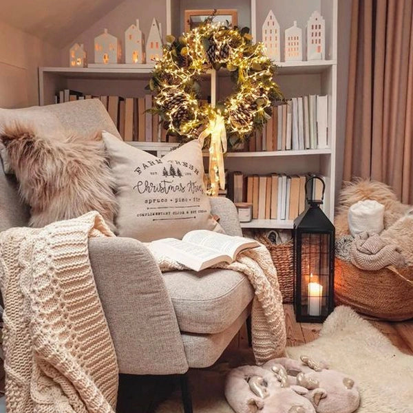 arrange a throw blanket to create a reading nook