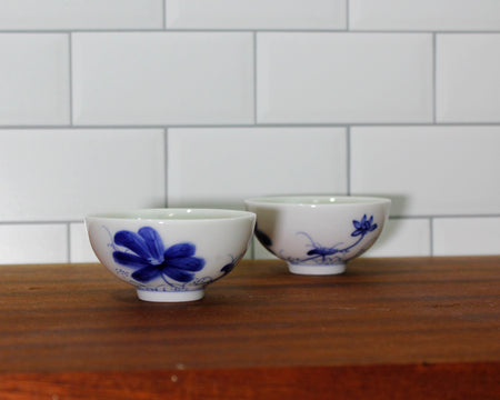 https://cdn.shopify.com/s/files/1/0464/5424/3494/products/blue-flower-cups-set-of-two-1_450x360.jpg?v=1673011400