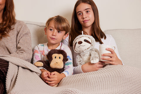 Boy and girl with Warmies Soft Toys