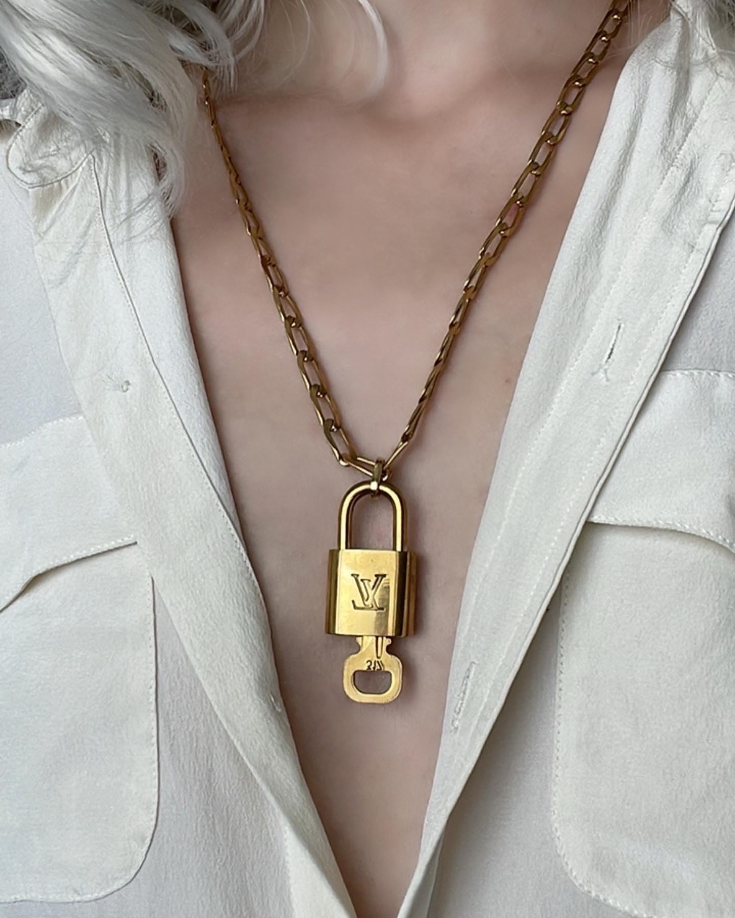 Louis Vuitton Silvertone Lock It Pendant Necklace in Metallic  Lyst