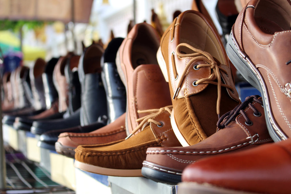 Many colors and styles of dress shoes