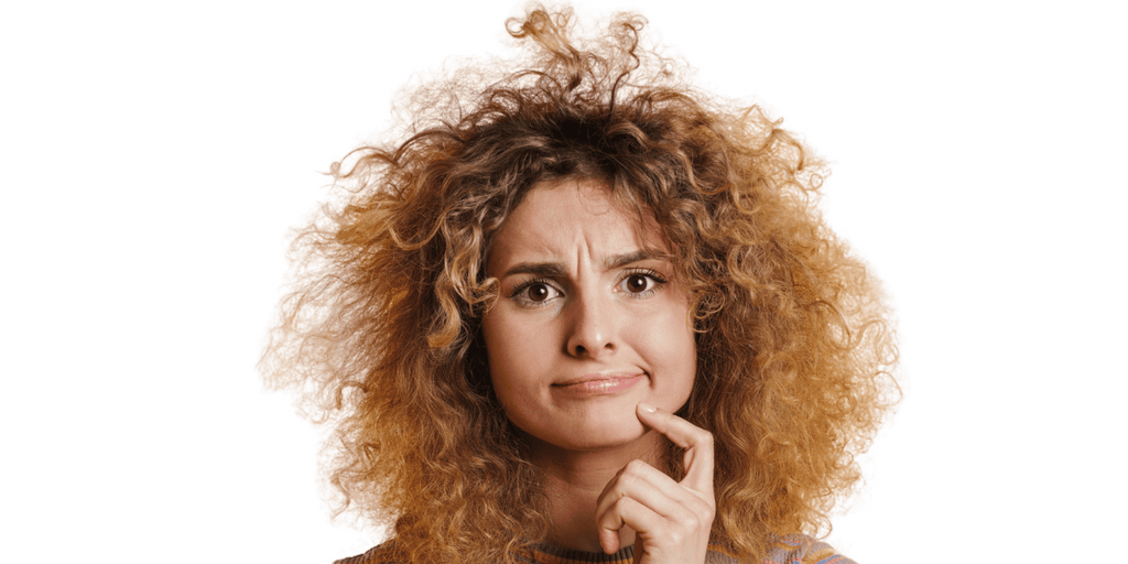 Curly Haired girl with frizz problems and hair is a mess