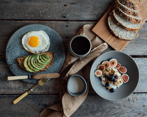 Foods for healthy hair including avocado, nuts and seeds, eggs.