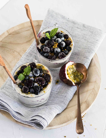 two chia bowls topped with blueberries and mint - chia bowl recipe