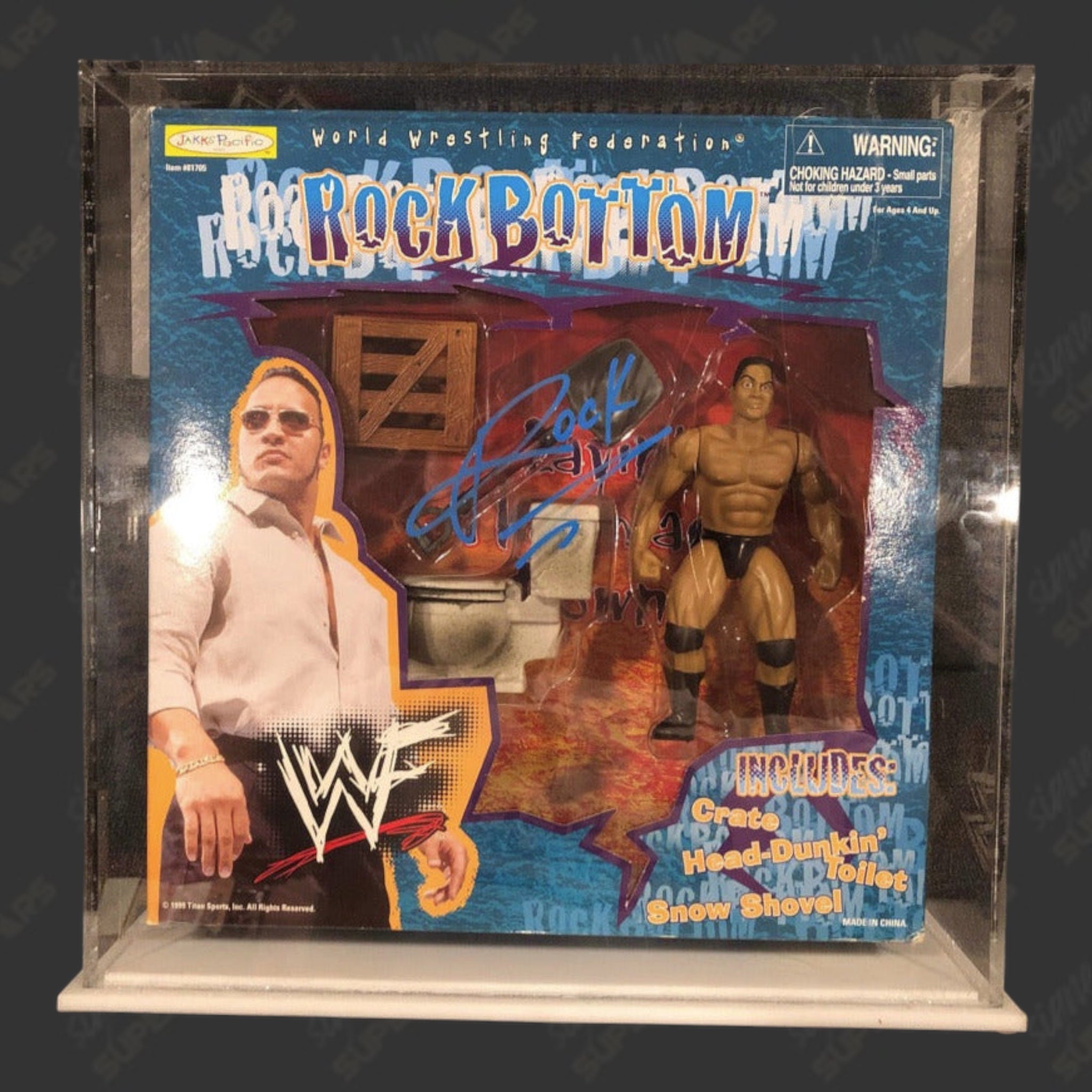 The Rock signed WWF Rock Bottom Action Figure in Display Case (w