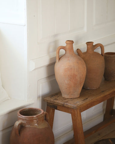 Collection of warm terracotta toned pots