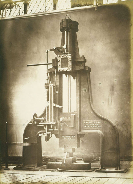 Steam Hammer by Nasmyth - Great Exhibition of 1851 Photograph of a triangular shaped machinery on two feet with a central shaft. Inscribed `J. Nasmyth's patent' and `J. Nasmyth & Co Engineers, Manchester'