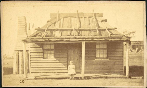 A young girl in front of a hut with bark roof, Gulgong, New South Wales, ca. 1872  https://nla.gov.au:443/tarkine/nla.obj-147977732