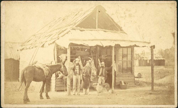 Three men and horse outside butcher's shop with bark roof, Gulgong, New South Wales, ca. 1872  https://nla.gov.au:443/tarkine/nla.obj-147986881