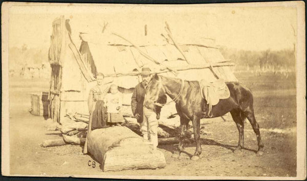 A family standing with horse in front of their hut, Gulgong, New South Wales, ca. 1872