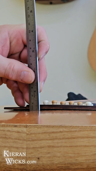 Luthier Rod McCracken measuring action on Kieran Wicks' Cole Clark Guitar Fat Lady 2 atThe Guitar Room - Kilmore Victoria