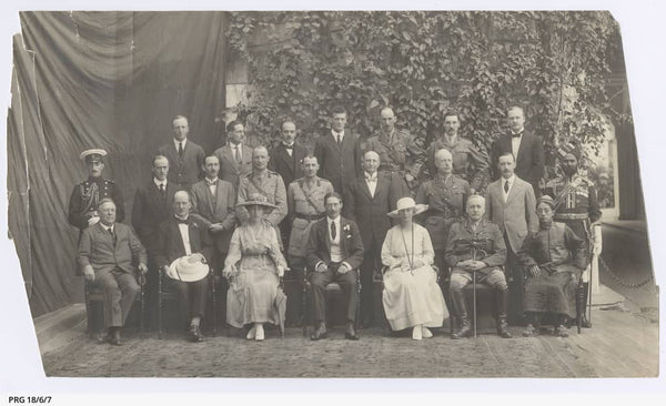 Group portrait of Ross Smith and officials at Government House, Calcutta - PRG-18-6-7 - https://www.catalog.slsa.sa.gov.au:443/record=b3197675~S1  Group portrait taken at Government House, Calcutta at the house party, January 1919. Left to right: (sitting) Sir Frank Sly, Lord Southborough, Lady Munro, The Governor (Lord Ronaldshay), Miss Graham, The Commander in Chief (Sir Charles Munro), and the Maharaja of Sikkim; (middle) Captain Lyons (A.D.C.), Mr Clauson, Major Sands, Major Muir, Major Macartney, Mr Hailey, Major-General Scott, Mr Campbell, and Risalda Faiz Muhuad Khan (A.D.C.); (back row) Ross Smith, Captain Hyde (A.D.C.), Captain Haskett-Smith (A.D.C.), Mr Wilkinson, Captain Bridges, Captain Troutbeck, and Captain Vaux.