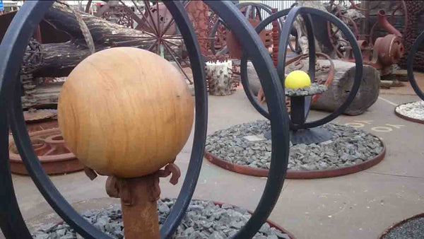 jimmy johnson metal sculptures wycheproof Yoyo-ologist Jimmy Johnson Outdoor Open Air Art Museum Metal welded sculptures geometric designs large stone balls Wycheproof Victoria