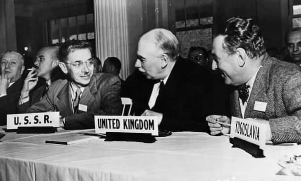 John Maynard Keynes (centre) played a leading role in the formulation of the Bretton Woods agreements and instrumental in the establishment of the IMF. 