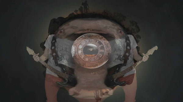 MIRRORED 360VR image of Kieran Wicks Playing Fender Electric Guitar, vintage pocket watch inlay, from the film clip Running in Slow Motion