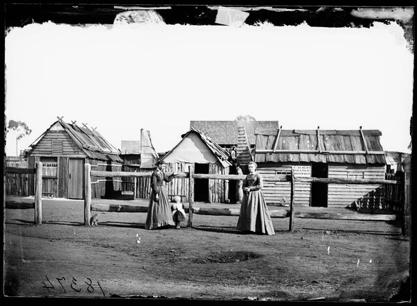 Louisa Lawson her son Charles William  and her sister Phoebe Albury outside Mrs. Albury's dressmaking shop Gulgong area