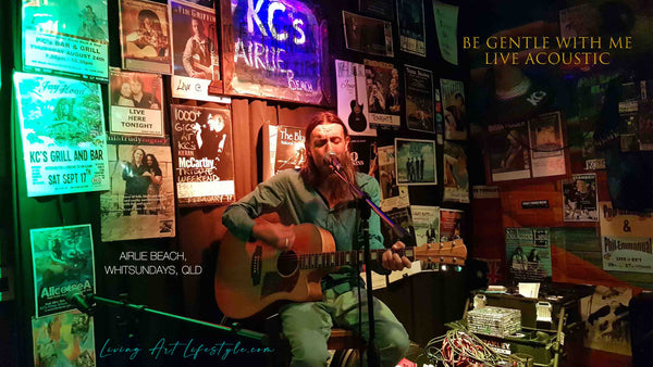 Be Gentle With Me By Kieran Wicks - Live Acoustic Rendition - Kieran Wicks perfomring Live on Stage with Cole Clark Acoustic Guitar at KC's Bar & Grill Airlie Beach Whitsundays, Stage wall covered in Band and Artist posters