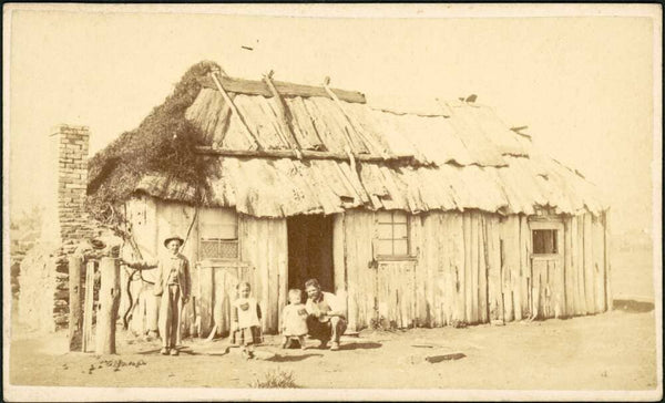 Man and children outside bark hut, Gulgong area, New South Wales, ca. 1872