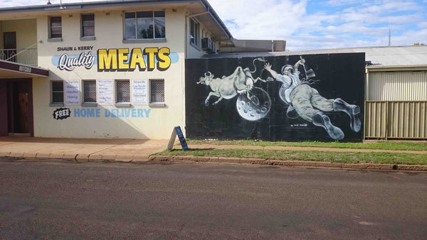 Butcher Shop Art Cow Jumping over the moon with Butcher and axe in pursuit Charleville QLD