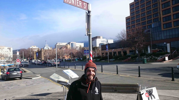 Kieran Wicks on Hunter Street Hobart Kings Pier Marina with City Hall in Background