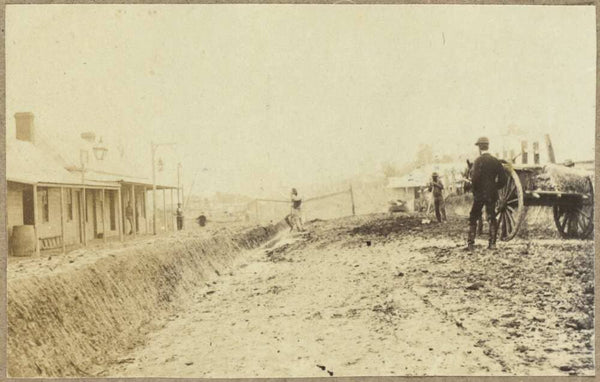 Road making and ditch digging outside Monie's Hill End Hotel, Henry Harris' Duke of Cornwall Hotel and J. Curtain's barber shop left, with horse drawn cart right foreground, Tambaroora Road, Hill End, New South Wales, ca.1872 https://nla.gov.au:443/tarkine/nla.obj-148071463