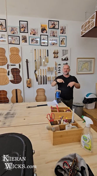 Luthier Rod McCracken in front of Guitar templates and Tools at The Guitar Room Luthier School Workshop - Kilmore Victoria