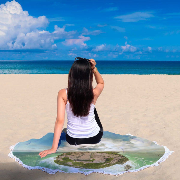 THE CAPE COLLECTION ROUND BEACH BLANKET, WOMEN LOOKING INTO THE HORIZON SITTING ON THE SAND AT THE BEACH. CAPE BRIDGEWATER VICTORIA